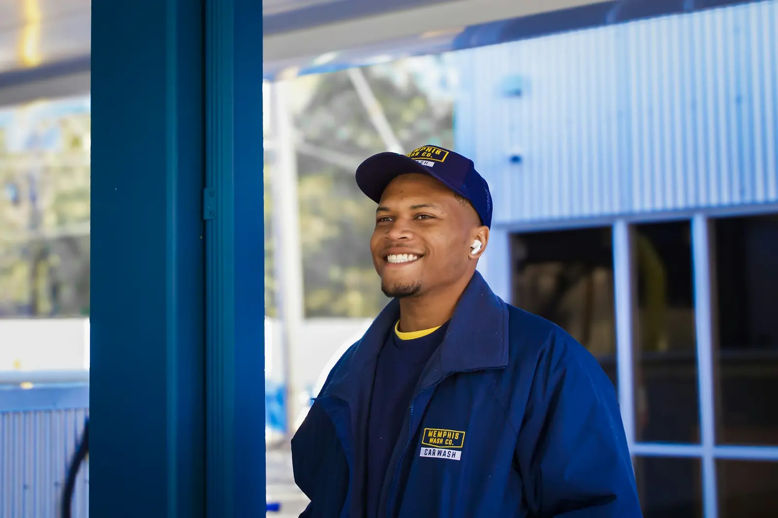 airnuvia technician in uniform at a building entrance